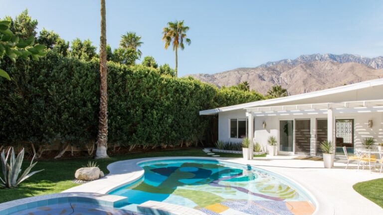 Swimming pool with a mural in a mansion in California